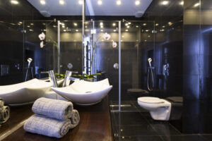 Black luxurious bathroom with countertop basin and shower